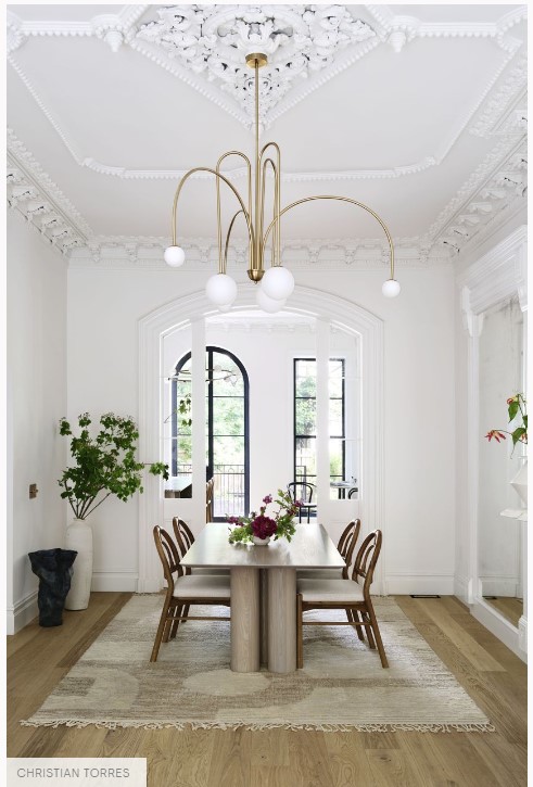 Traditional ceiling design with modern style light fixture. Mix of design styles.
